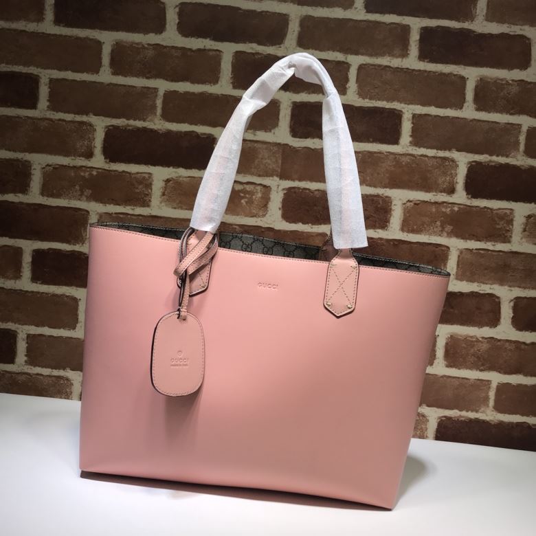 G*u*i shopping bags